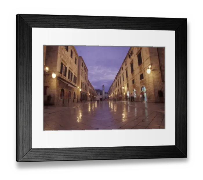 Framed Print : Looking east down the Stradun (Placa) towards the clock tower at night with shiny Framed Print : Looking east down the Stradun (Placa) towards the clock tower at night with shiny