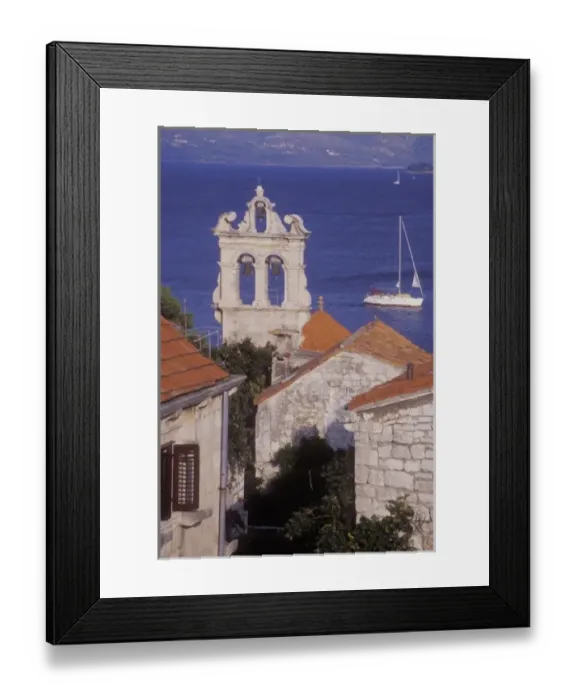 Framed Print : All Saints Church (Svi Sveti) with a sailboat in the background. Korcula Island. Croatia Framed Print : All Saints Church (Svi Sveti) with a sailboat in the background. Korcula Island. Croatia