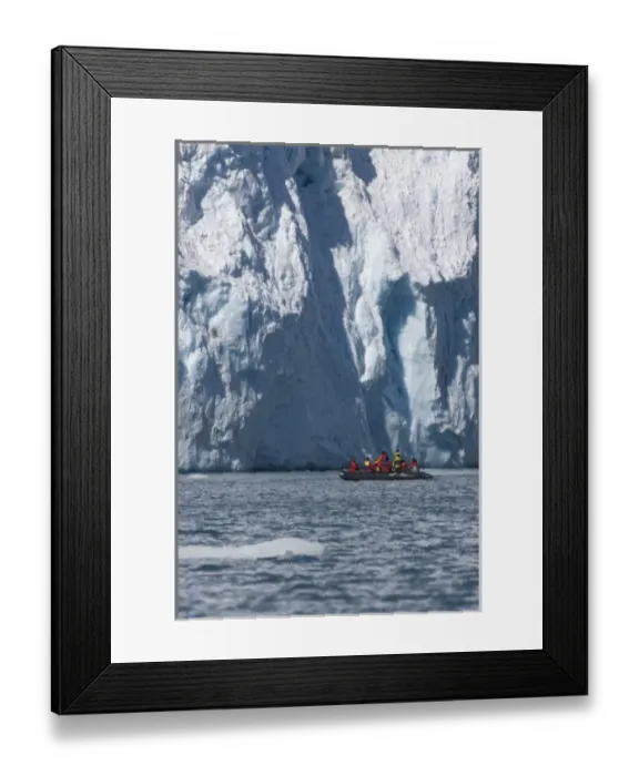 Framed Print : Zodiac with iceberg in the ocean, Antarctica Framed Print : Zodiac with iceberg in the ocean, Antarctica