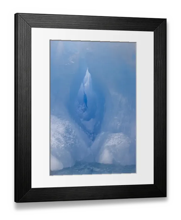 Framed Print : Antarctica, South Shetland Islands. A vivid blue iceberg reveals a glowing chamber Framed Print : Antarctica, South Shetland Islands. A vivid blue iceberg reveals a glowing chamber