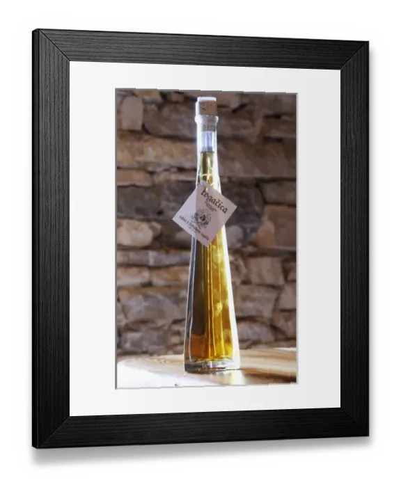 Framed Print : Rakija grappa type spirit flavoured with herbs backlit, Rogacica, Toreta Vinarija
