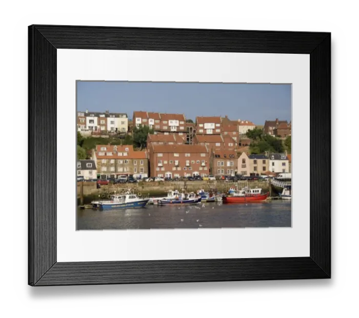 Framed Print : Harbor with fishing boats in the Harbor of beautiful tourist town of Whitby England Framed Print : Harbor with fishing boats in the Harbor of beautiful tourist town of Whitby England