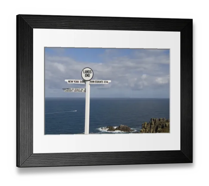 Framed Print : Southernmost tip of England Lands End in Cornwall sign of distances on cliff Framed Print : Southernmost tip of England Lands End in Cornwall sign of distances on cliff