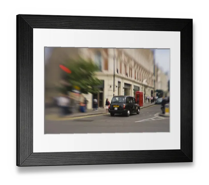 Framed Print : England, London. Black taxicab zooms through Londons streets Framed Print : England, London. Black taxicab zooms through Londons streets