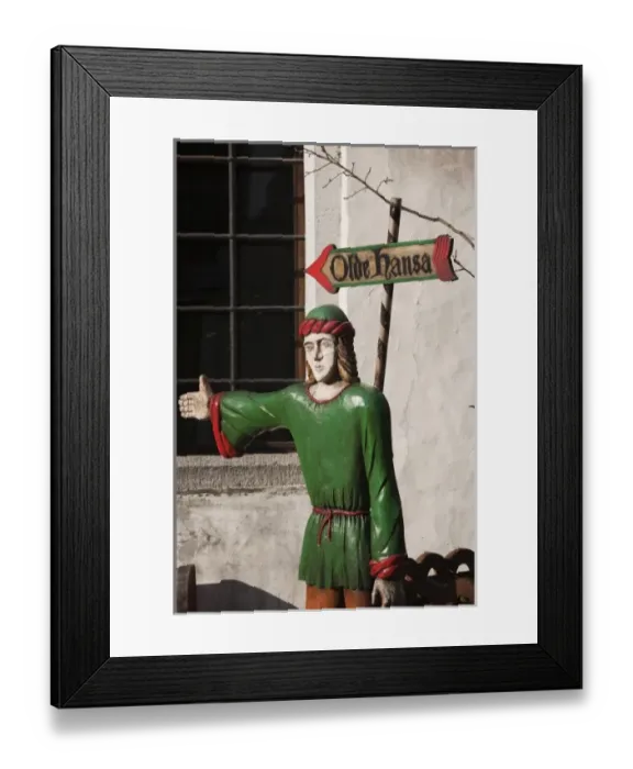 Framed Print : Estonia, Tallinn, Old Town, sign and statue to the Old Hansa restaurant Framed Print : Estonia, Tallinn, Old Town, sign and statue to the Old Hansa restaurant