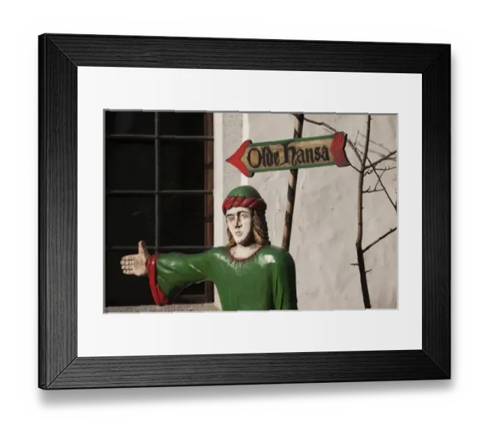 Framed Print : Estonia, Tallinn, Old Town, sign and statue to the Old Hansa restaurant