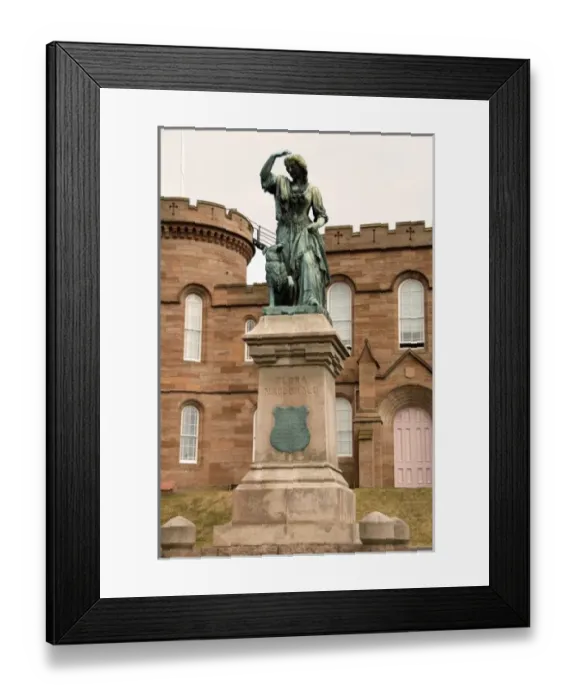Framed Print : Statue to heroine Flora Macdonald in front of the famous Inverness Castle in quaint
