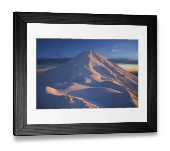 Framed Print : Syme Hut (at left), Fanthams Peak, and Alpenglow at Dawn on Mt Taranaki  /  Mt Egmont