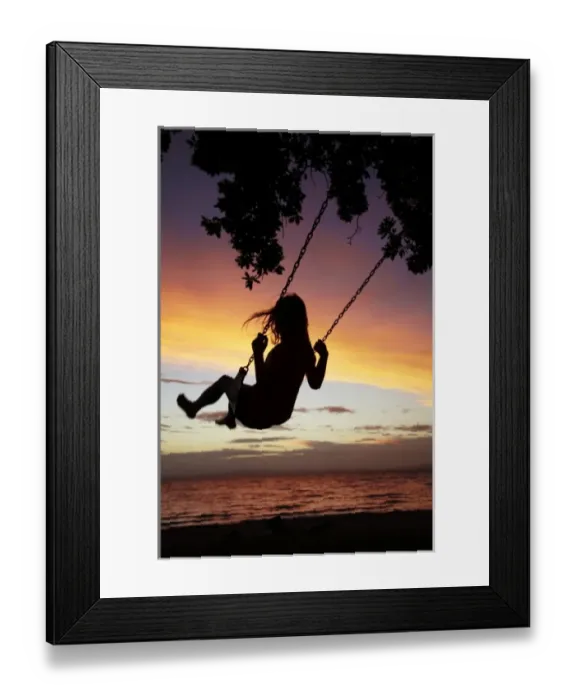 Framed Print : Young Girl on Rope Swing under Pohutukawa Tree at Sunset, Thames, Coromandel, North Island Framed Print : Young Girl on Rope Swing under Pohutukawa Tree at Sunset, Thames, Coromandel, North Island