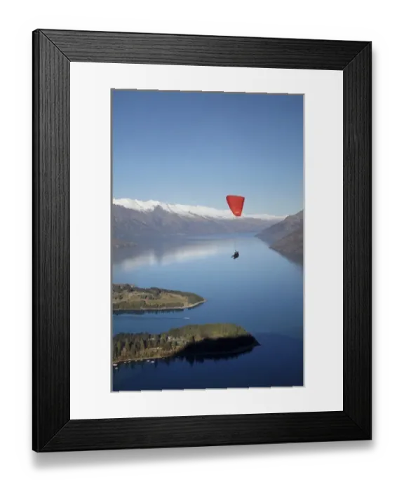 Framed Print : Paraglider, The Remarkables and Lake Wakatipu, Queenstown, South Island, New Zealand Framed Print : Paraglider, The Remarkables and Lake Wakatipu, Queenstown, South Island, New Zealand