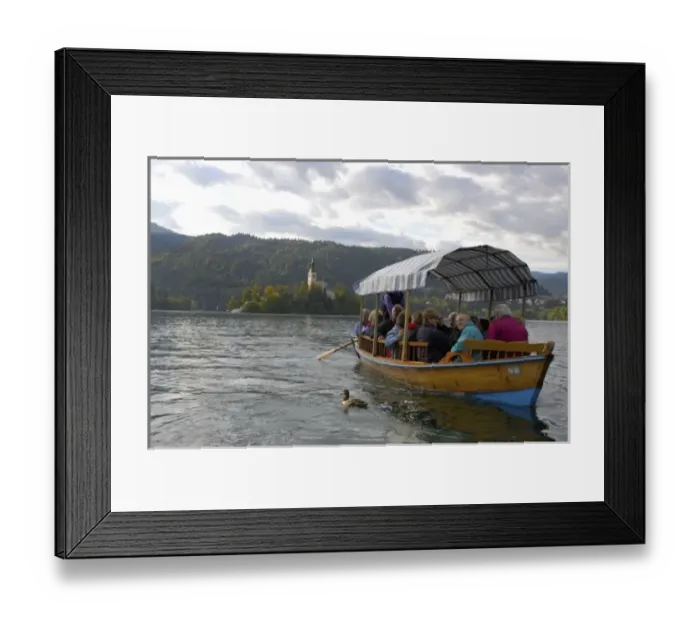 Framed Print : Slovenia, Bled, Lake Bled, pletna boat and Bled Island chapel