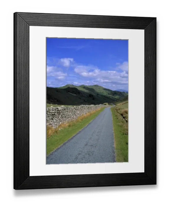 Framed Print : Wales, Gwynedd Co. Gregennen. Rocks walls delineate many of the roads in the valleys