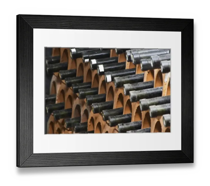 Framed Print : Bottles laying down piled high in terracotta earthenware tube containers. VitaI Vitaai Framed Print : Bottles laying down piled high in terracotta earthenware tube containers. VitaI Vitaai