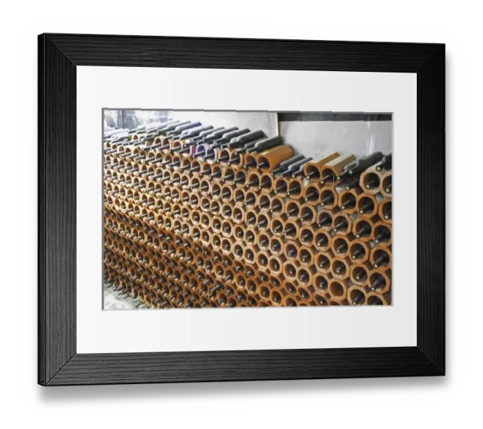 Framed Print : Bottles stored laying down piled high in terracotta earthenware tube containers Framed Print : Bottles stored laying down piled high in terracotta earthenware tube containers