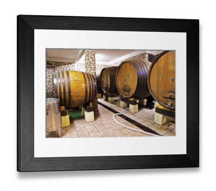 Framed Print : The underground wine cellar with old oak barrels for storing the wine. VitiI Vitaai Framed Print : The underground wine cellar with old oak barrels for storing the wine. VitiI Vitaai
