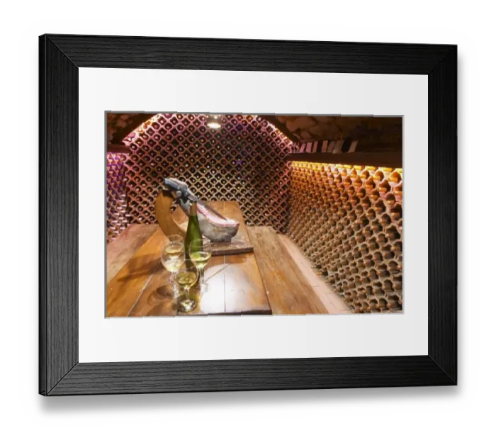 Framed Print : The wine cellar and tasting room, walls are lined with bottles stacked in terracotta Framed Print : The wine cellar and tasting room, walls are lined with bottles stacked in terracotta