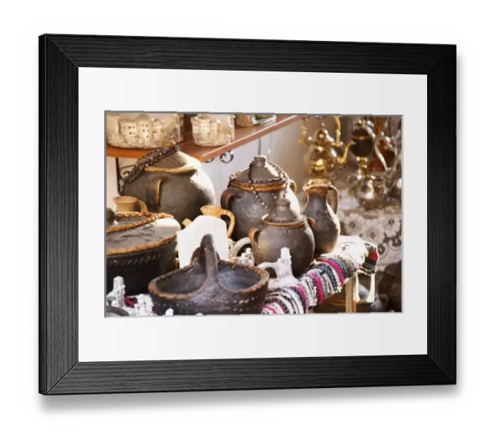 Framed Print : Bazar street Kujundziluk, souvenir shop selling traditional black glazed earthenware cooking pots