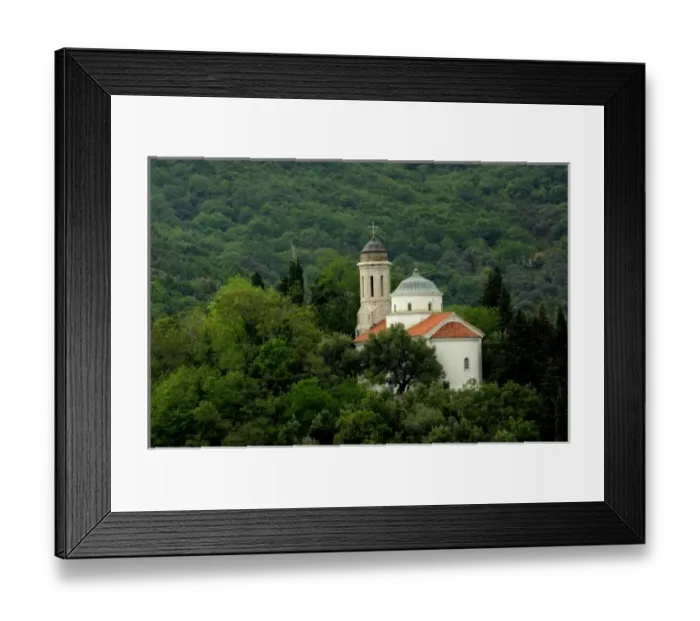 Framed Print : Europe, Montenegro, Perast. Typical church located within the dark forest along