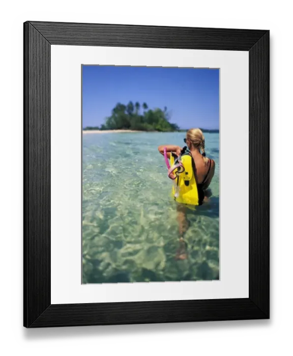 Framed Print : Solomon Islands, Nggaranomah Island. Woman with diving gear (MR) Framed Print : Solomon Islands, Nggaranomah Island. Woman with diving gear (MR)