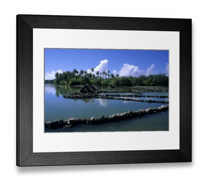 Framed Print : Old fashioned fish huts and canals in Tahiti in French Polynesia in the South Pacific Rim