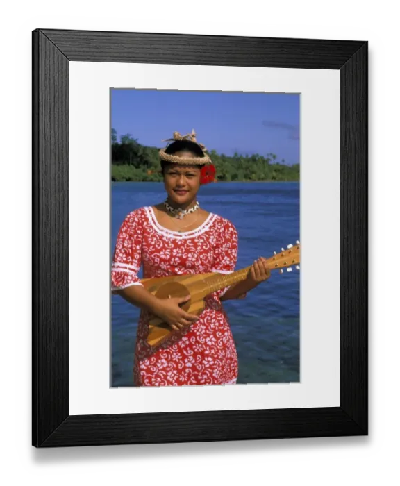 Framed Print : Oceania, French Polynesia, Tahiti. native woman playing music. MR Framed Print : Oceania, French Polynesia, Tahiti. native woman playing music. MR