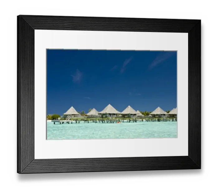 Framed Print : Over the water huts of tropical resort in beautiful Bora Bora
