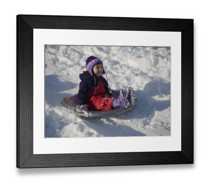 Framed Print : Four year old girl sledding in the winter at Mt. Rainier National Park, Washington. (MR) Framed Print : Four year old girl sledding in the winter at Mt. Rainier National Park, Washington. (MR)