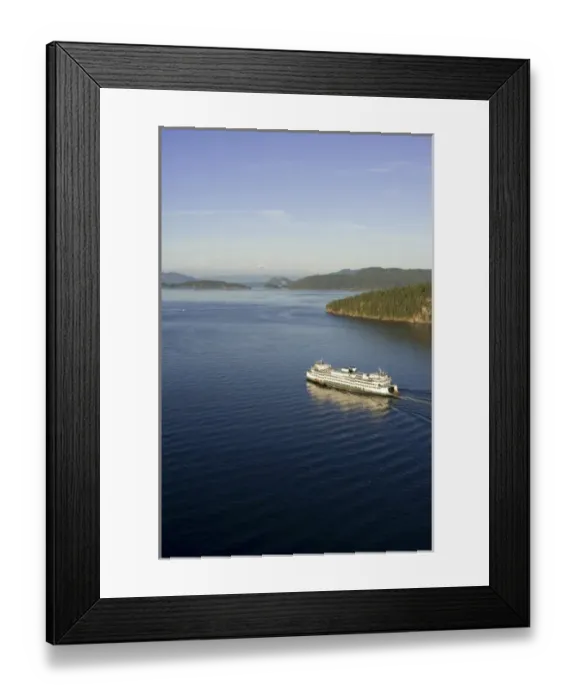 Framed Print : The Washington State ferry Hyak passing by Shaw Island in the evening light with Mt Framed Print : The Washington State ferry Hyak passing by Shaw Island in the evening light with Mt