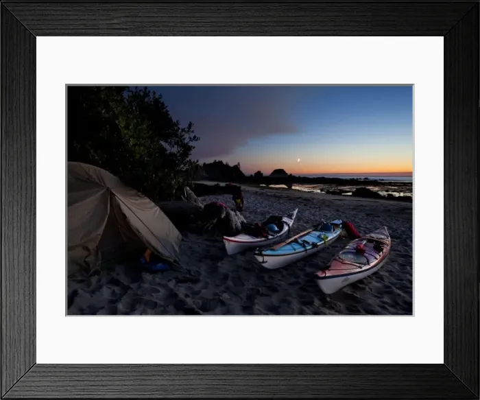 Framed Print : USA, WA, Olympic National Park. Sea kayaks and tent at kayaker camp, with crescent moon at sunset Framed Print : USA, WA, Olympic National Park. Sea kayaks and tent at kayaker camp, with crescent moon at sunset