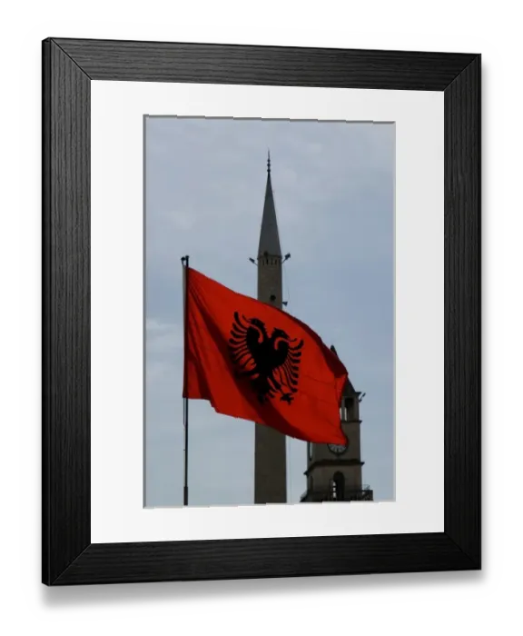 Framed Print : Albania, Tirana, Albanian flag in Skanderbeg square, minaret and bell tower Framed Print : Albania, Tirana, Albanian flag in Skanderbeg square, minaret and bell tower