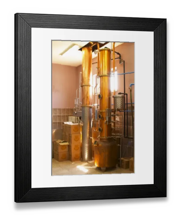 Framed Print : Distillation machine still with steel and copper boiler and column to make grape juice spirit Framed Print : Distillation machine still with steel and copper boiler and column to make grape juice spirit