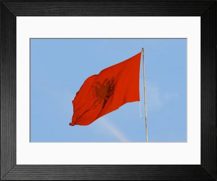 Framed Print : The Albanian flag banner, red with a black double headed eagle. The Tirana Main Central Square Framed Print : The Albanian flag banner, red with a black double headed eagle. The Tirana Main Central Square