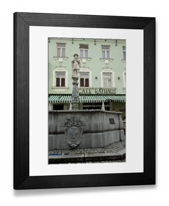 Framed Print : Austria, Wachau Valley, Melk. Historic downtown Melk, fountain in front of Cafe Rathaus Framed Print : Austria, Wachau Valley, Melk. Historic downtown Melk, fountain in front of Cafe Rathaus