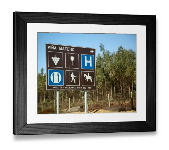 Framed Print : South America, Chile, Casablanca Valley. A road sign with international symbols Framed Print : South America, Chile, Casablanca Valley. A road sign with international symbols