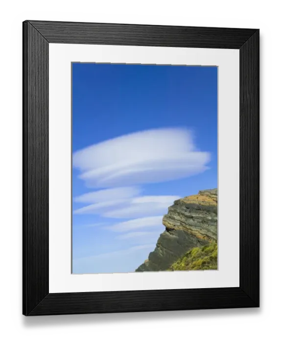 Framed Print : Dramatic clouds in the blue sky over huge rock, Torres del Paine National Park, Patagonia Framed Print : Dramatic clouds in the blue sky over huge rock, Torres del Paine National Park, Patagonia