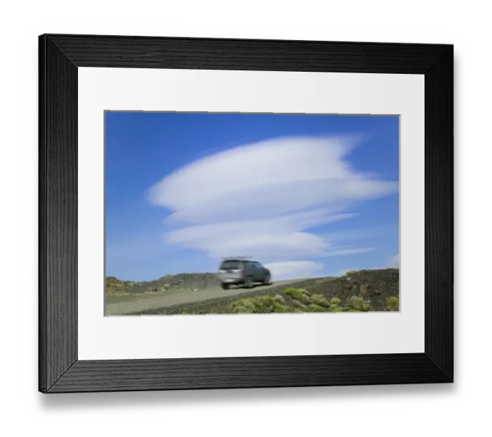 Framed Print : A jeep on the road in the mountain, dramatic clouds in the blue sky, Torres del Paine National Park Framed Print : A jeep on the road in the mountain, dramatic clouds in the blue sky, Torres del Paine National Park