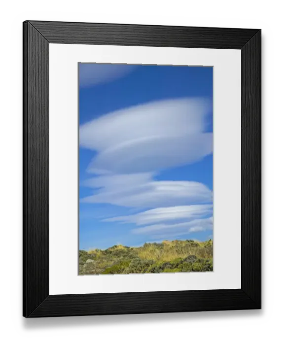 Framed Print : Dramatic clouds in the blue sky over meadow, Torres del Paine National Park, Patagonia Framed Print : Dramatic clouds in the blue sky over meadow, Torres del Paine National Park, Patagonia