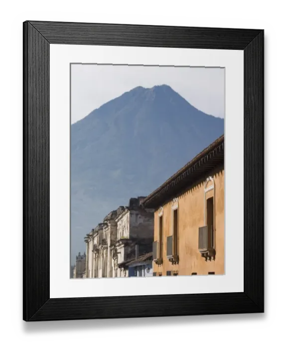 Framed Print : Antigua, Guatemala Building facades and nearby vocano