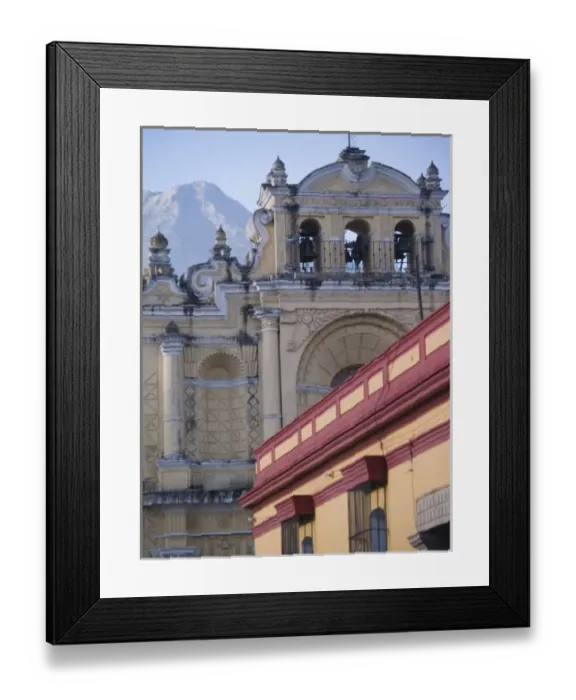 Framed Print : Antigua, Guatemala. Lamps in the colonial arched doorways near the town square at twilight