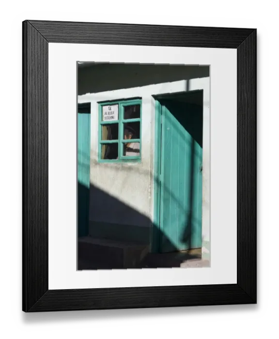 Framed Print : Guatemala, Western Highlands, Lake Atitlan, San Pedro. A telephone shop in San Pedro