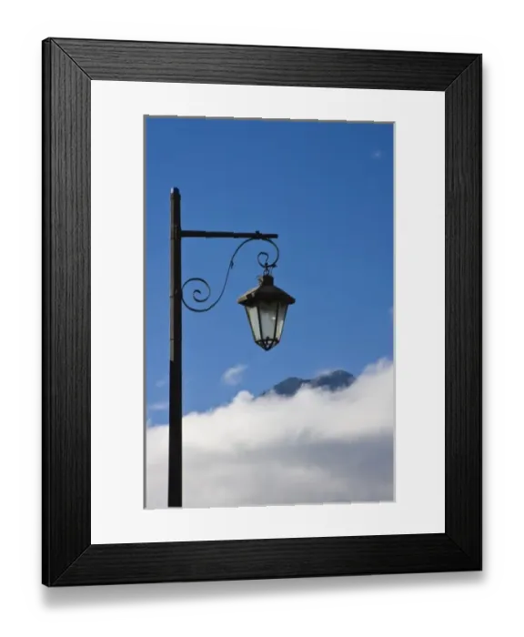 Framed Print : Guatemala, Antigua. Lamp post with Volcano Agua in background covered with clouds Framed Print : Guatemala, Antigua. Lamp post with Volcano Agua in background covered with clouds
