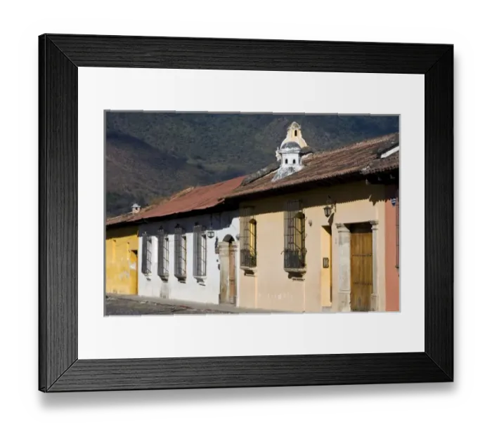 Framed Print : Guatemala, Antigua. A typical colorful street in Antigua