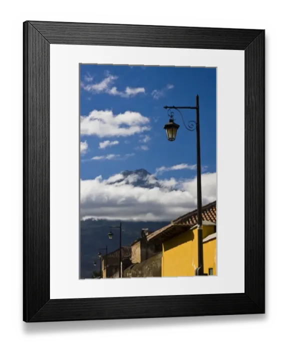 Framed Print : Guatemala, Antigua. Lamp post with Volcano Agua in background covered with clouds Framed Print : Guatemala, Antigua. Lamp post with Volcano Agua in background covered with clouds