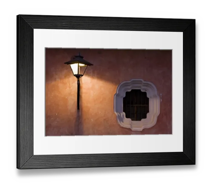Framed Print : Guatemala, Antigua. Lantern on a colorful wall turned on in the evening Framed Print : Guatemala, Antigua. Lantern on a colorful wall turned on in the evening