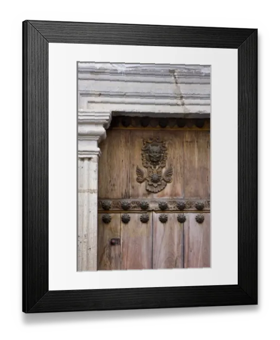 Framed Print : Guatemala, Antigua. Ornate detail on wooden door and trim on a colonial home in Antigua Framed Print : Guatemala, Antigua. Ornate detail on wooden door and trim on a colonial home in Antigua