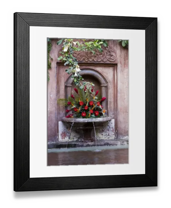 Framed Print : Guatemala, Antigua. Fountain decorated with flowers in a hotel in the town of Antigua