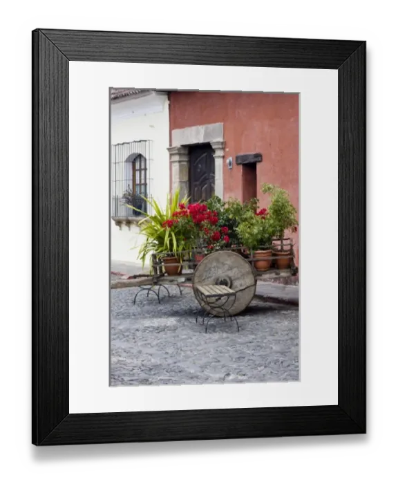 Framed Print : Guatemala, Antigua. An old wooden cart filled with flowers on the streets of Antigua Framed Print : Guatemala, Antigua. An old wooden cart filled with flowers on the streets of Antigua