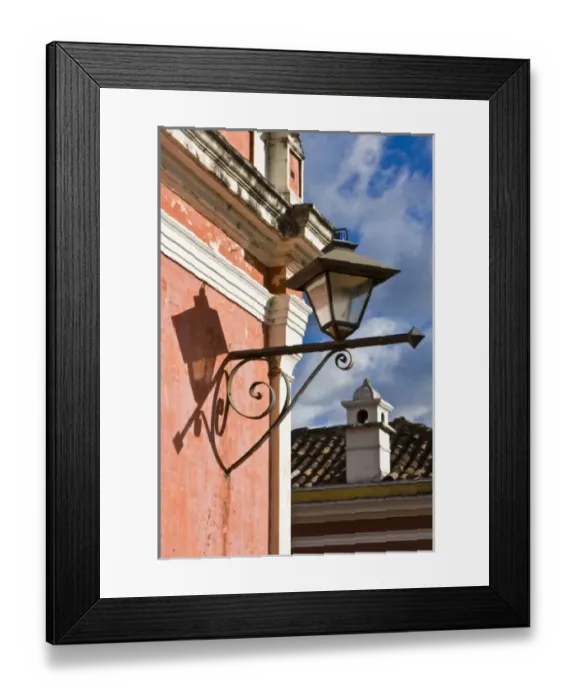 Framed Print : Guatemala, Antigua. Lantern on a street corner building in the town of Antigua