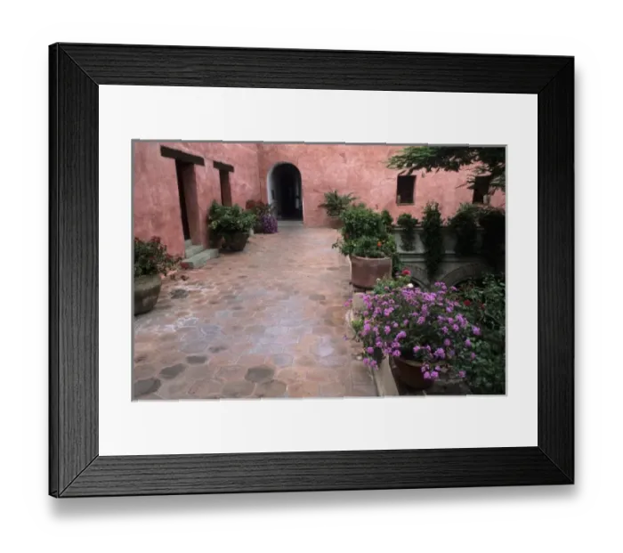 Framed Print : Beautiful colors of Mexico Architecture stucco with flowers and arches in Oaxaca Mexico