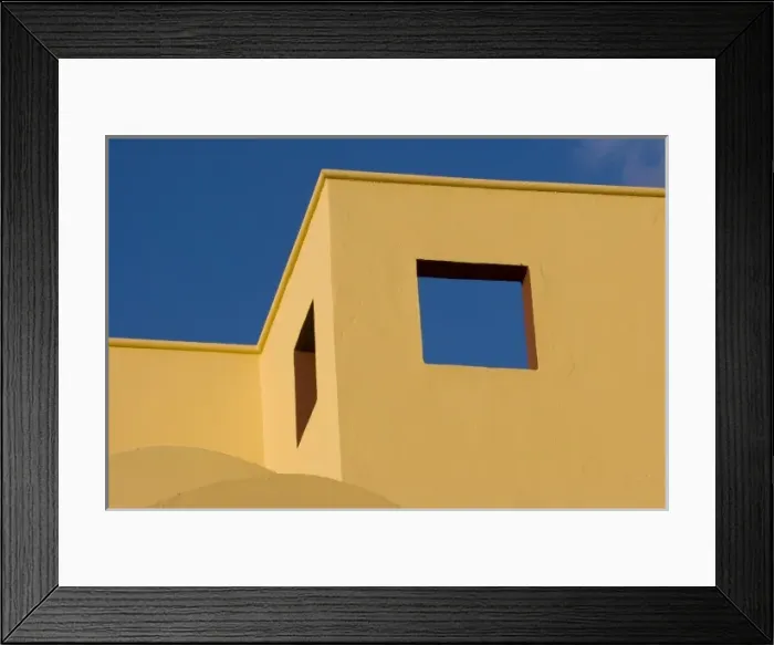 Framed Print : Mexico, San Miguel de Allende. Angled roofline of yellow building against blue sky Framed Print : Mexico, San Miguel de Allende. Angled roofline of yellow building against blue sky